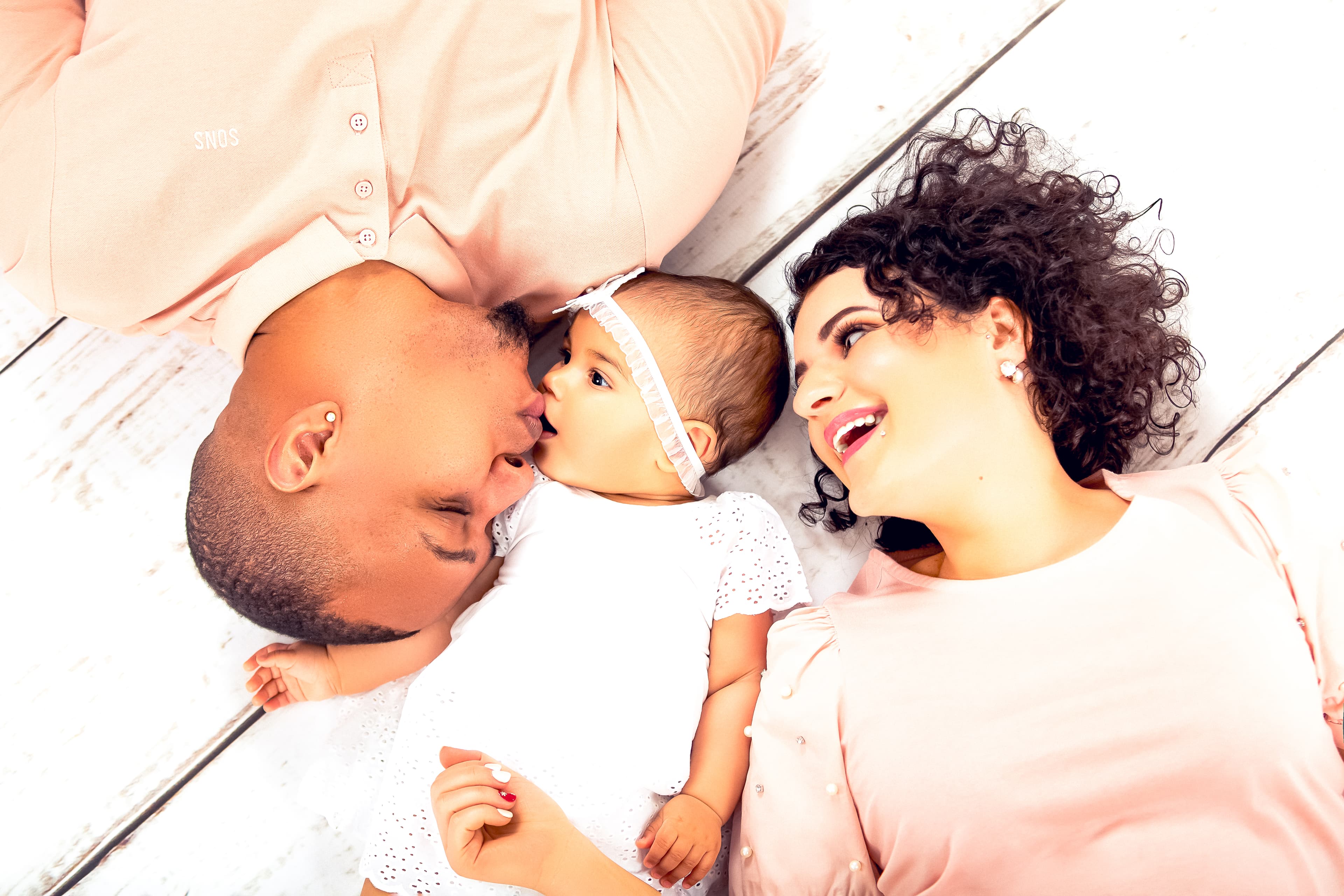 Top-down couple with newborn baby